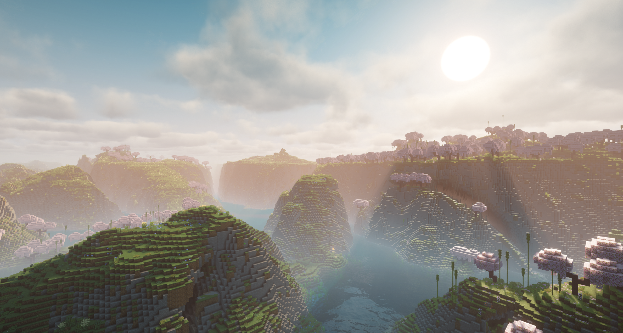 Sunrise breaking across a vast mountain valley in The Frontier